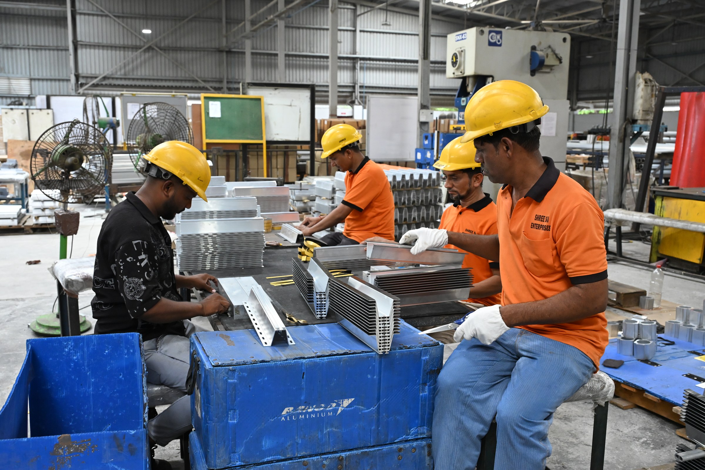 Banco Aluminium operator at a CNC machining centre on the fabrication floor