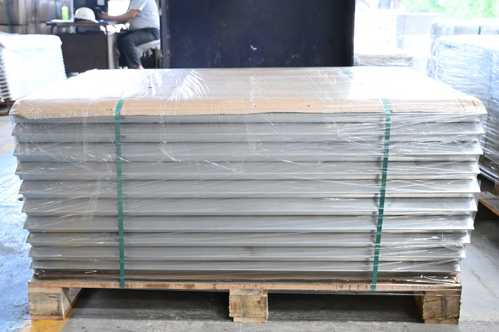 Shrink wrap with supporting wooden pallet