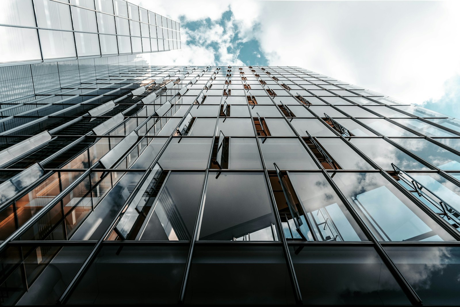 Modern glass curtain wall building, showing an aluminium structural glazing system