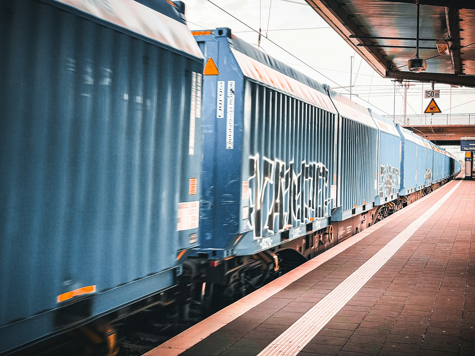 Modern passenger train at platform, with aluminium structural profiles in rail vehicles